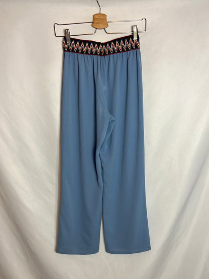 TEEN BY AGATAS. Flowy blue trousers with waist detail. Size 12 years.