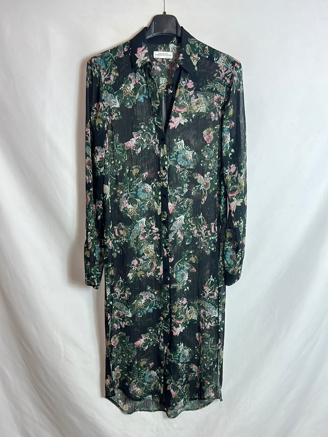 ZARA. Over a long, semi-sheer floral shirt. XS