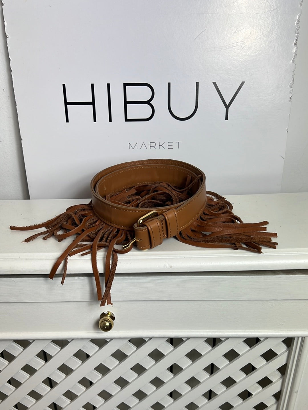 PRISCILA WELTER. Cinturón camel flecos. T 90