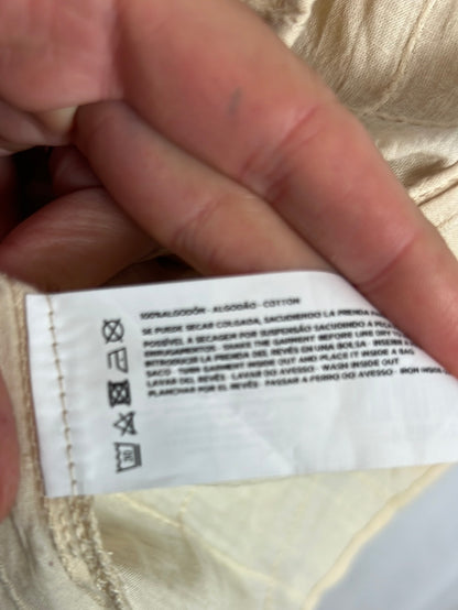 TINTORETTO. Blusa beige volante T.s