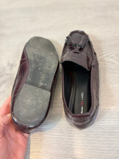 Mocasines efecto piel en burdeos. T 38
