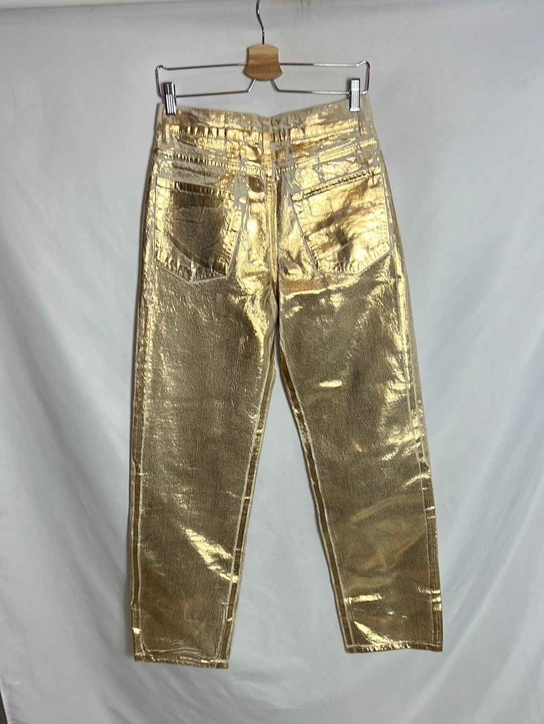 ZARA. Gold distressed denim trousers. Size 38