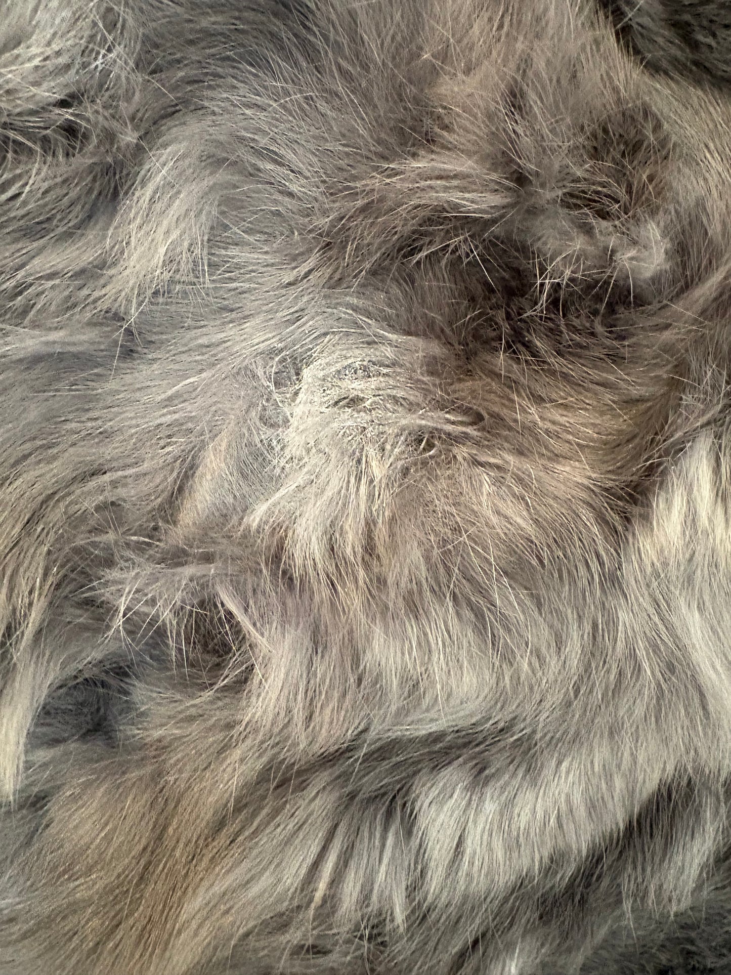 OTRAS. Chaleco pelo natural gris