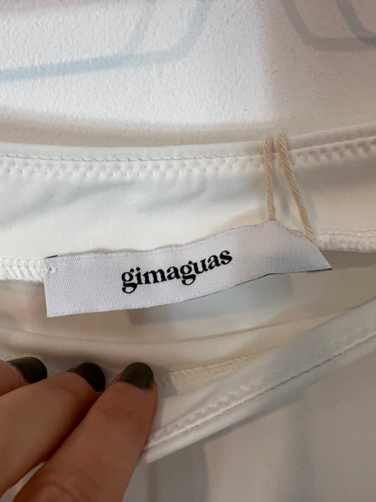 GIMAGUAS. Falda blanca corta semi elástica. T L