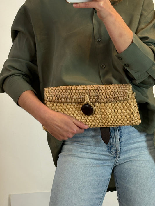 OTRAS. Cartera de mano rafia