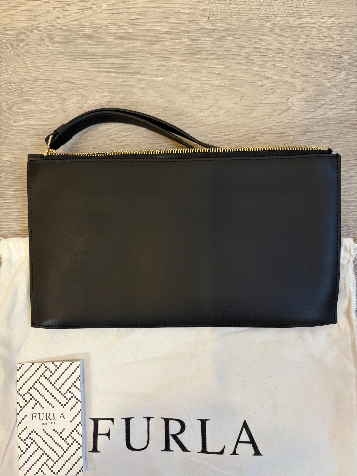 FURLA. Cartera de mano piel