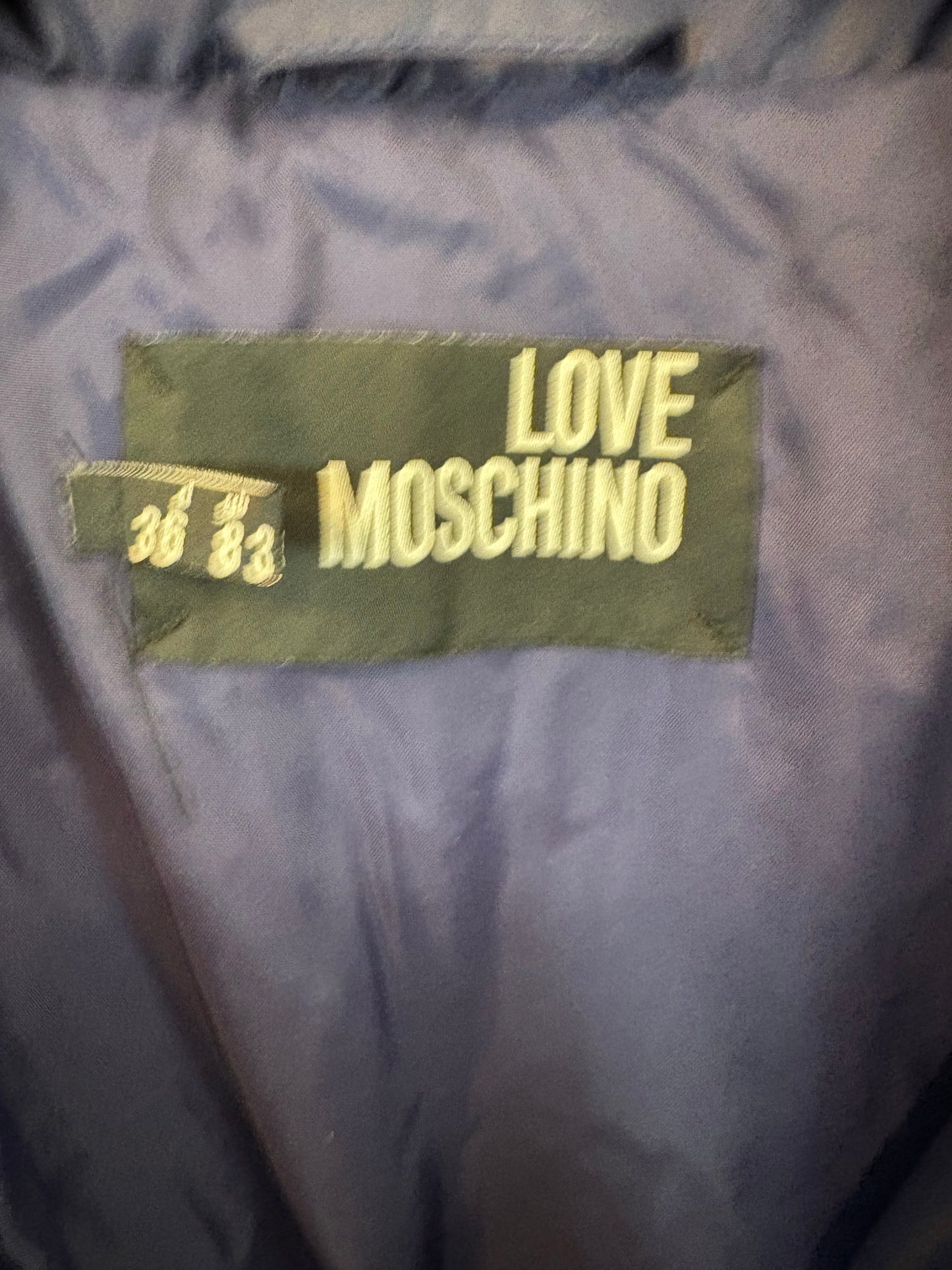 LOVE MOSCHINO. Plumas azul detalles T.36
