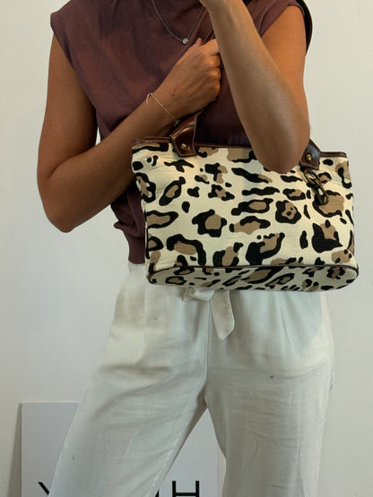 SYNTHESIS. Animal print bag with leather