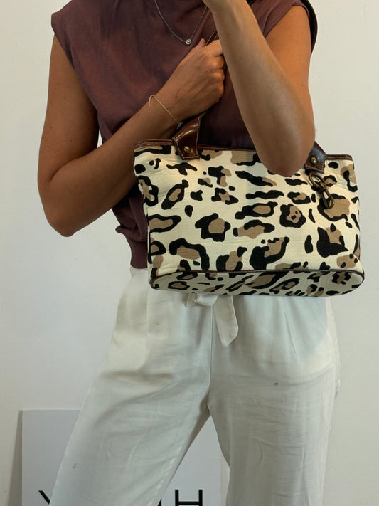 SINTESIS. Bolso animal print con piel