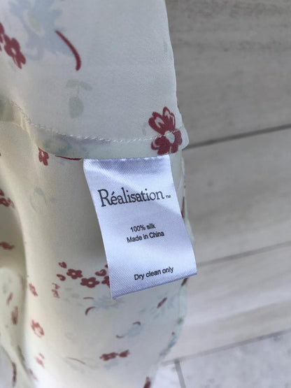 RÉALISATION. Vestido corto seda etamapdo flores