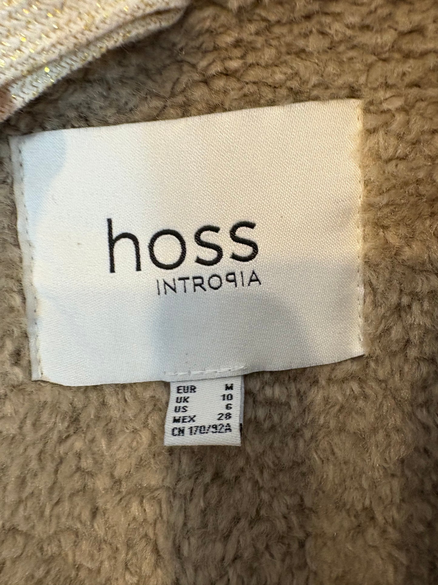 INTROPIA. Abrigo doble faz bordados