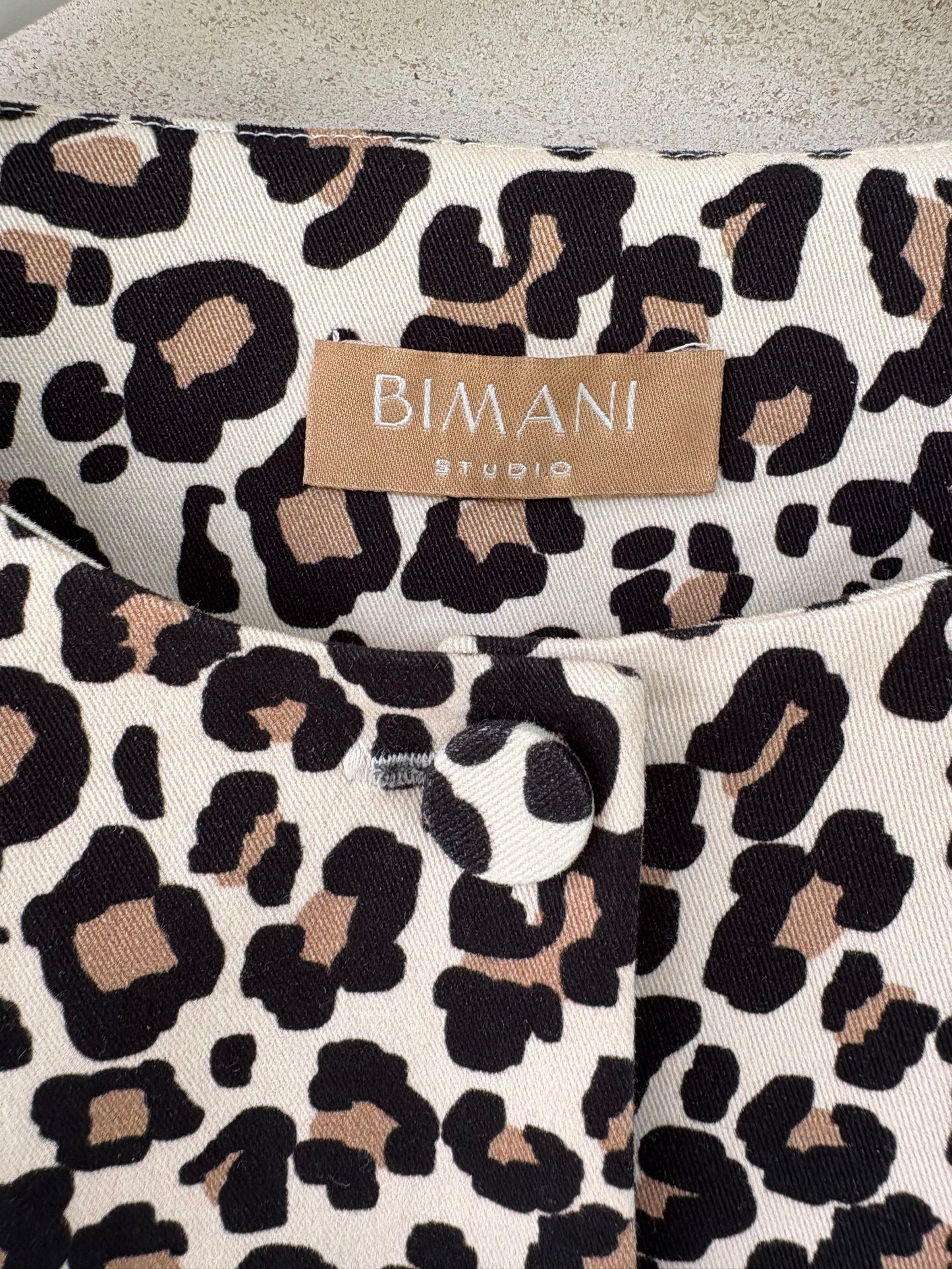 BIMANI. Animal print lantern sleeve top. T.S.