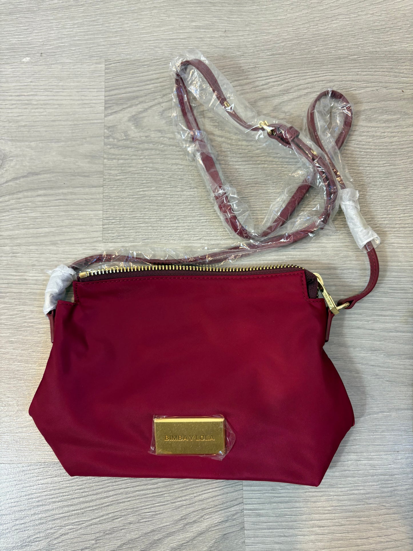 BIMBA Y LOLA. Bolso tela burdeos