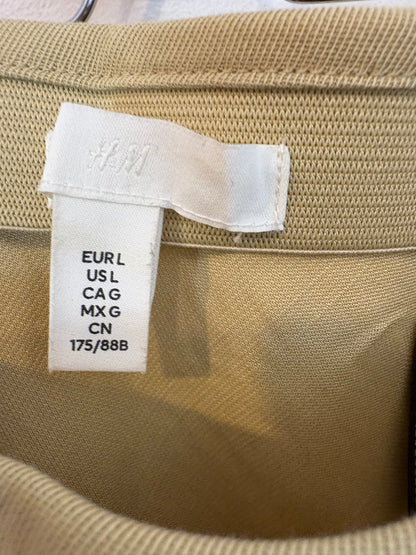 H&M. Falda larga fluida beige