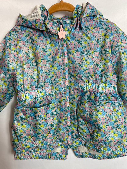 H&M. Abrigo impermeable flores T. 6-9 meses