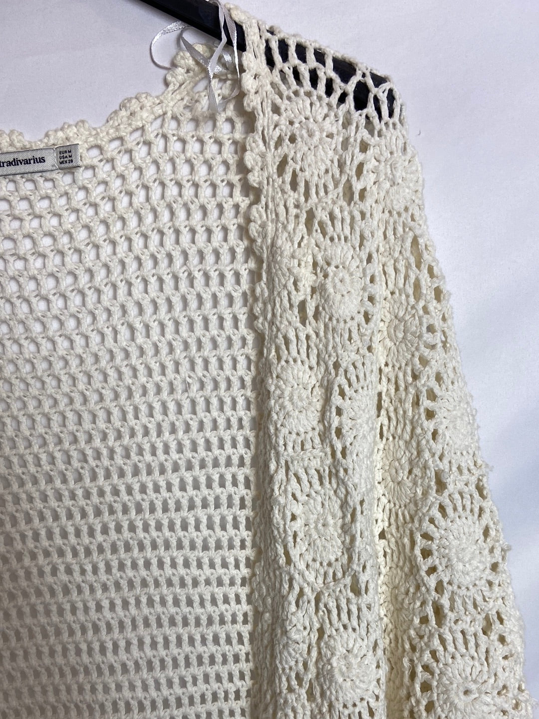 STRADIVARIUS. Chaqueta beige punto abierto  T.M