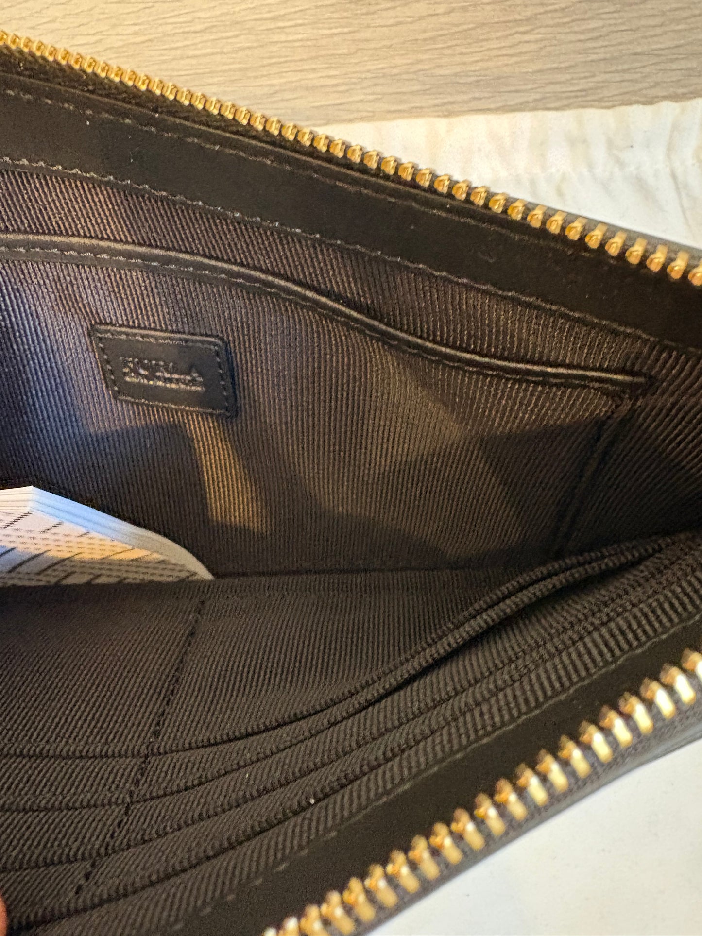 FURLA. Cartera de mano piel