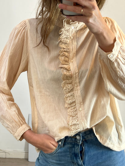 SFERA. Beige blouse with embroidered ruffle. TM