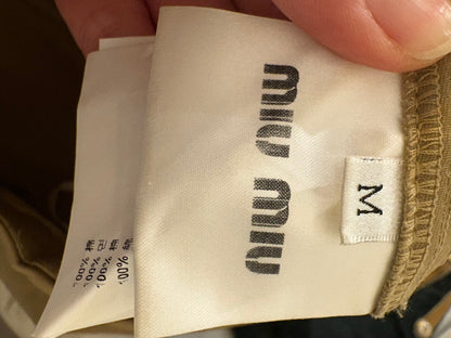 MIU MIU. Falda midi bolsillos T.m