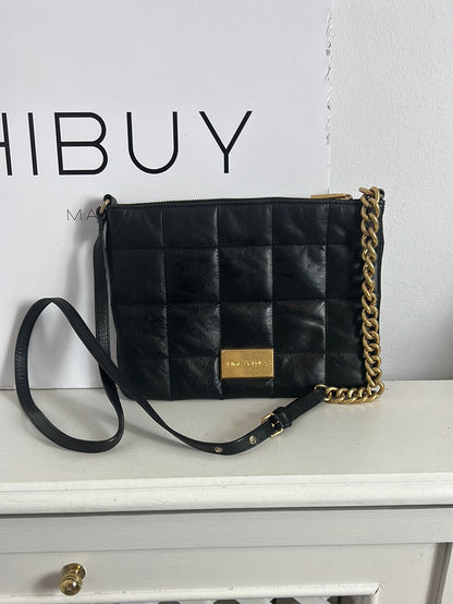 BIMBA Y LOLA. Flat quilted leather bag (Tara)