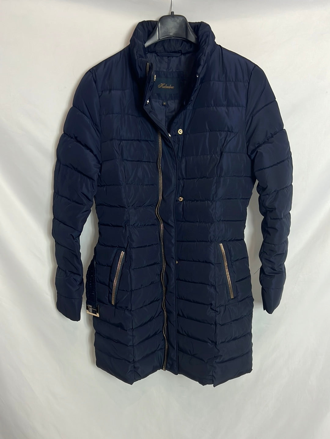 KELREBEC. Plumas azul detalle cremallera. T M