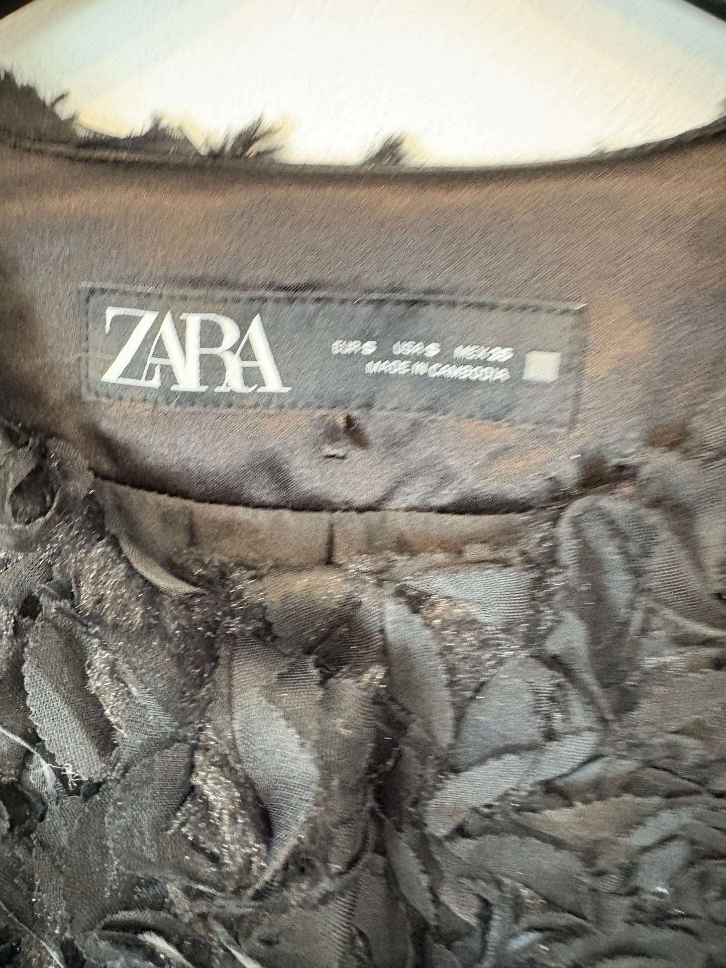 ZARA. Black petal jacket. TS