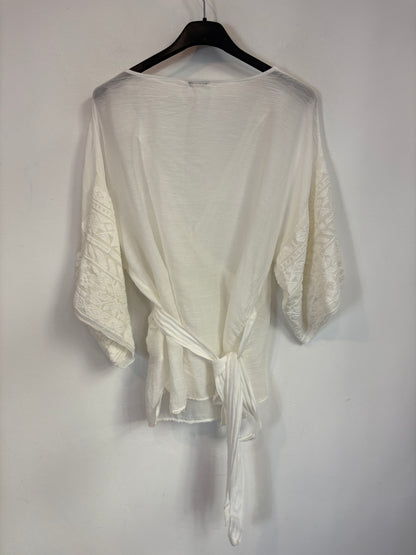 MOTEL. Blusa blanca cruzada con seda