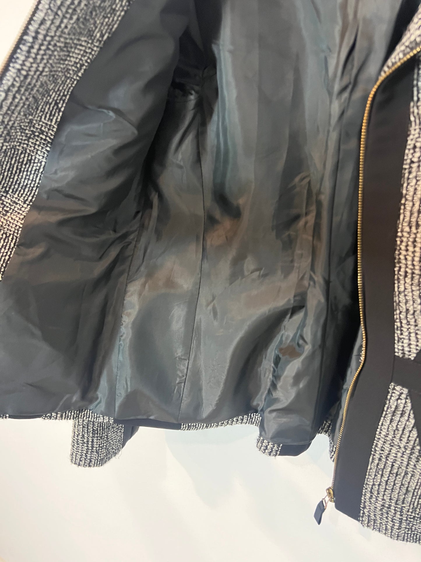 SFERA. Chaqueta  negra jaspeada con lana. T M