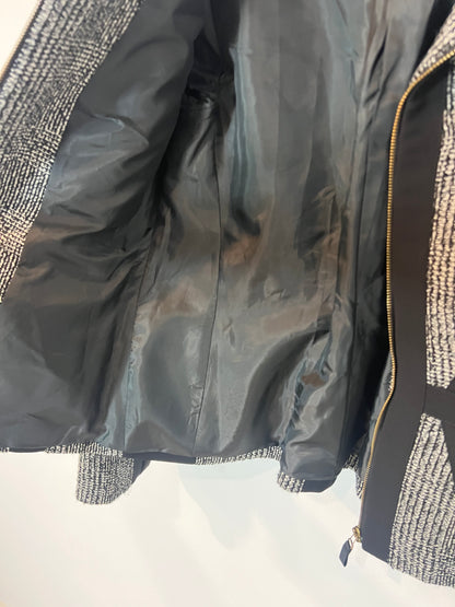 SFERA. Chaqueta  negra jaspeada con lana. T M