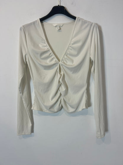 H&M. Top blanco canalé abertura. T M