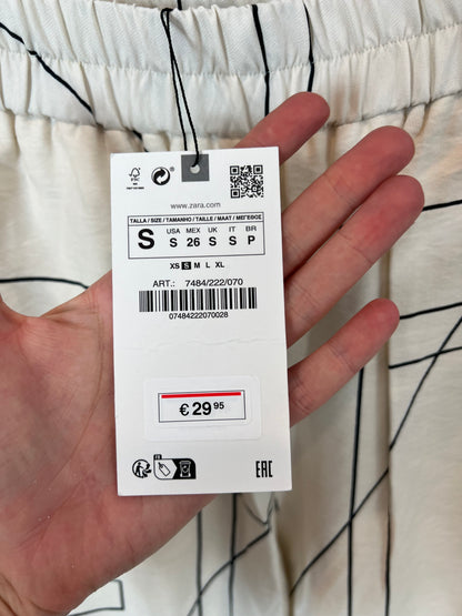 ZARA. Pantalón fluido beige estampado geométrico . T S