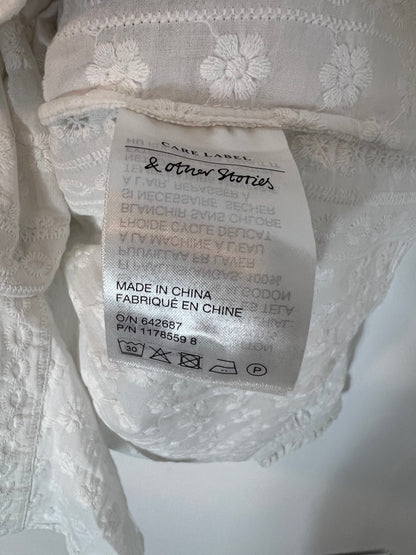 &amp;OTHER STORIES. White blouse embroidered with flowers. T.S.