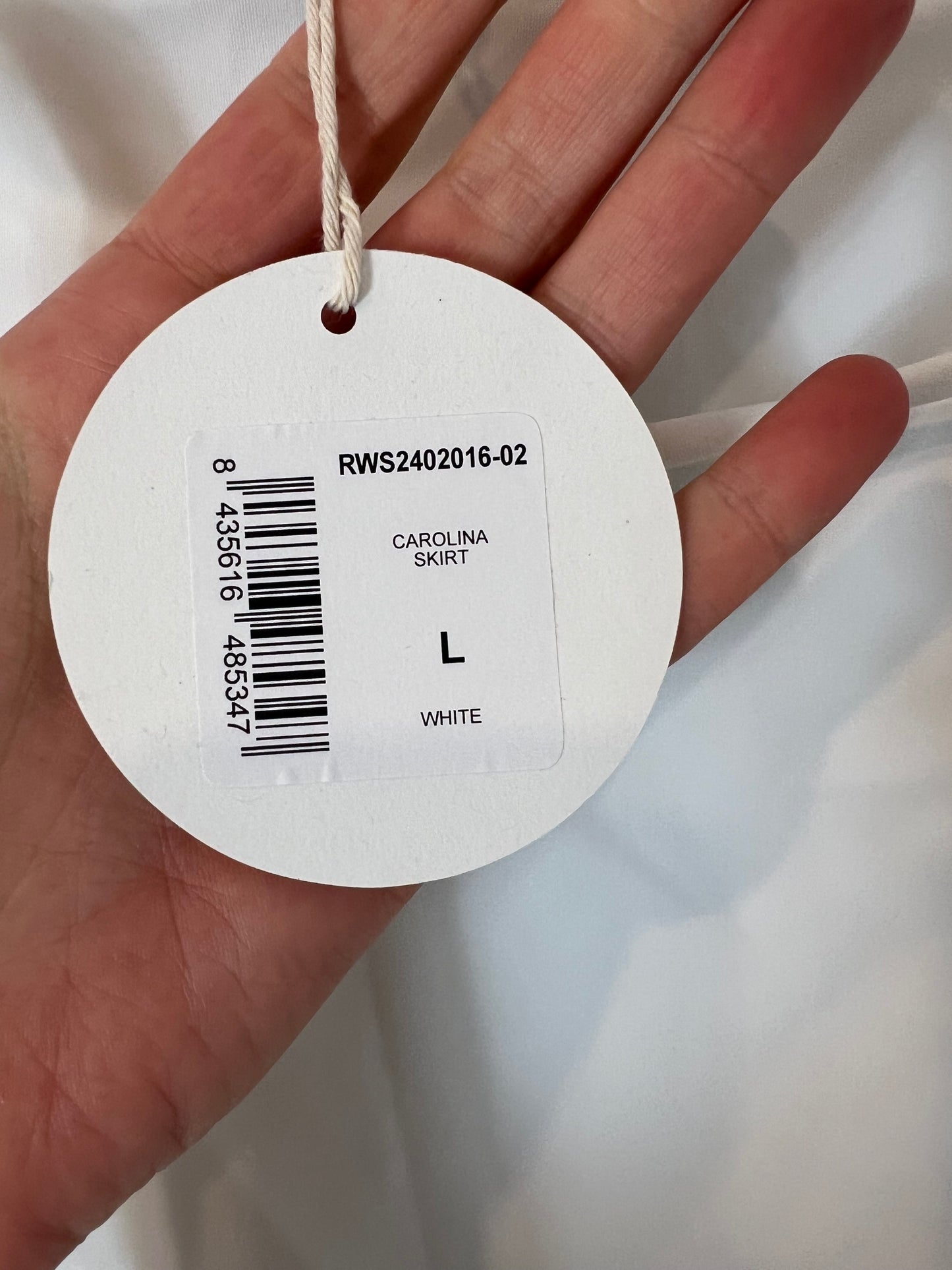 GIMAGUAS. Falda blanca corta semi elástica. T L