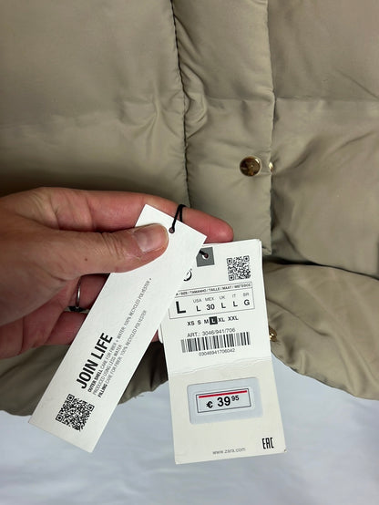 ZARA. Chaleco beige acolchado. T L