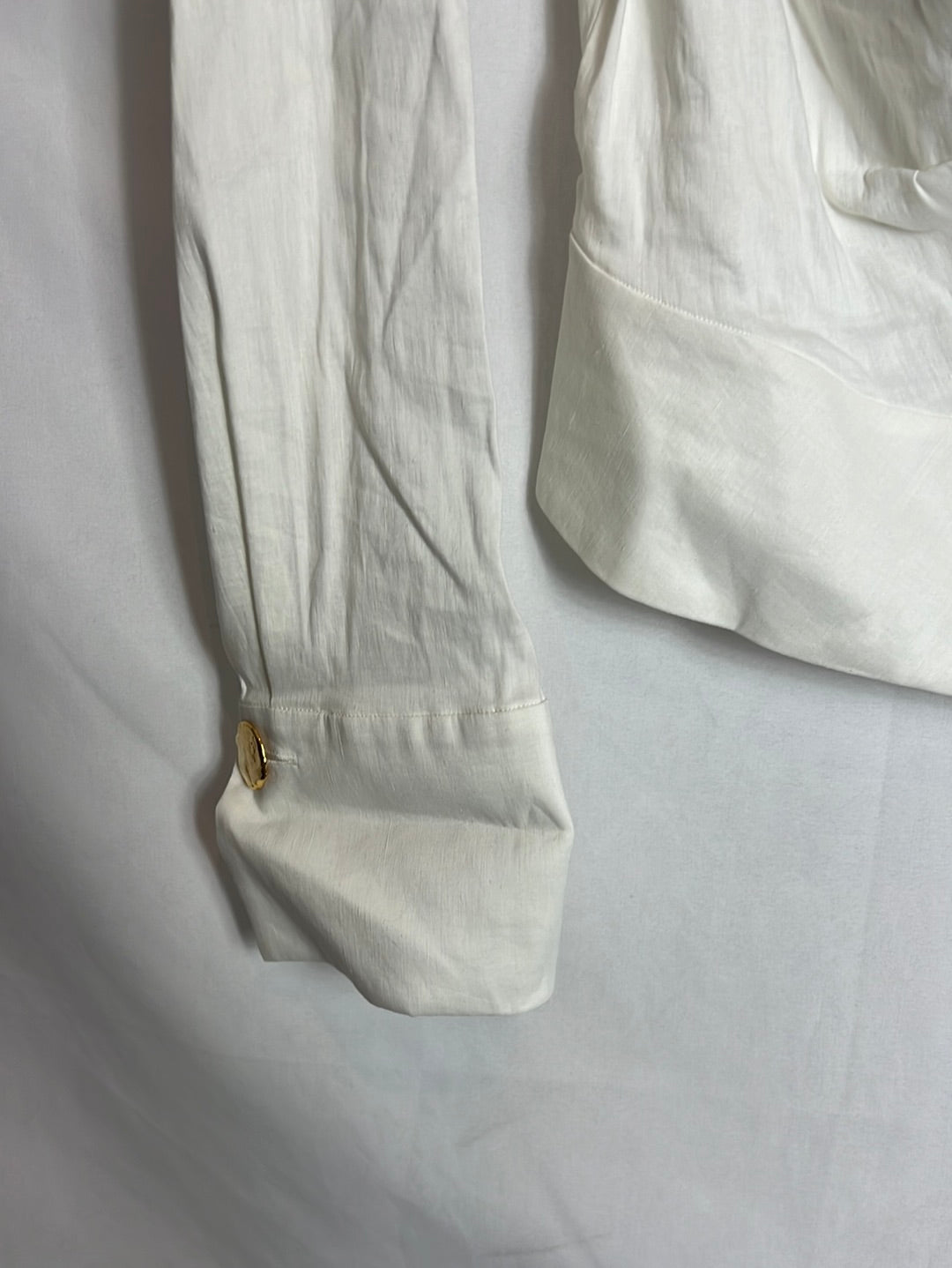 ZARA. Asymmetrical textured top. TL