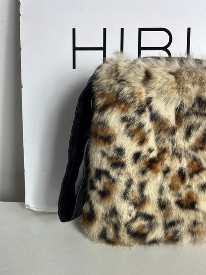OTRAS. Bolso de mano pelo animal print