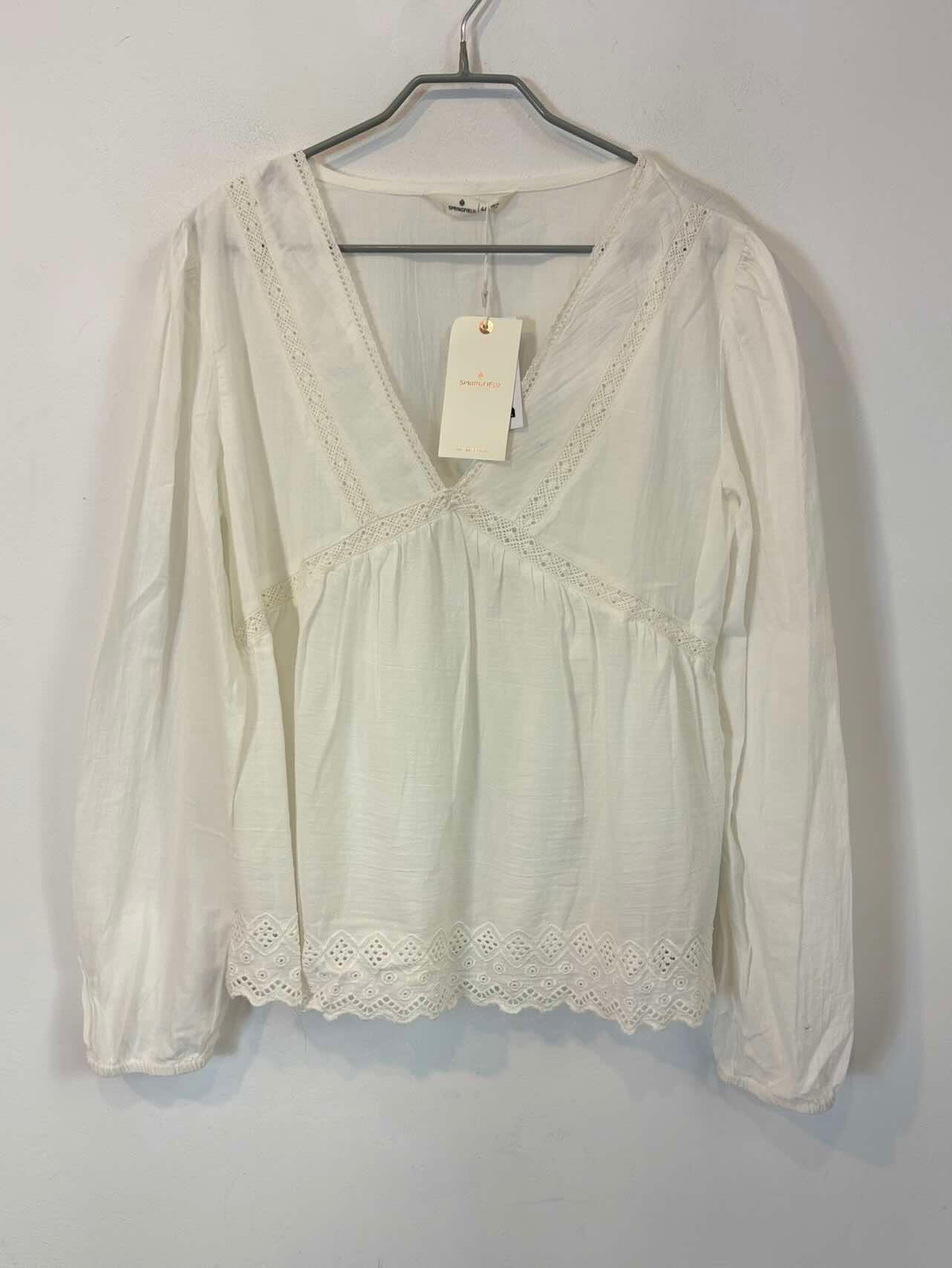 Blusa blanca detalles croché