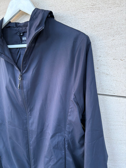 UNIQLO. Navy blue pocketable windbreaker. TL
