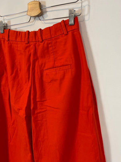 COS. Red pleated trousers S.34