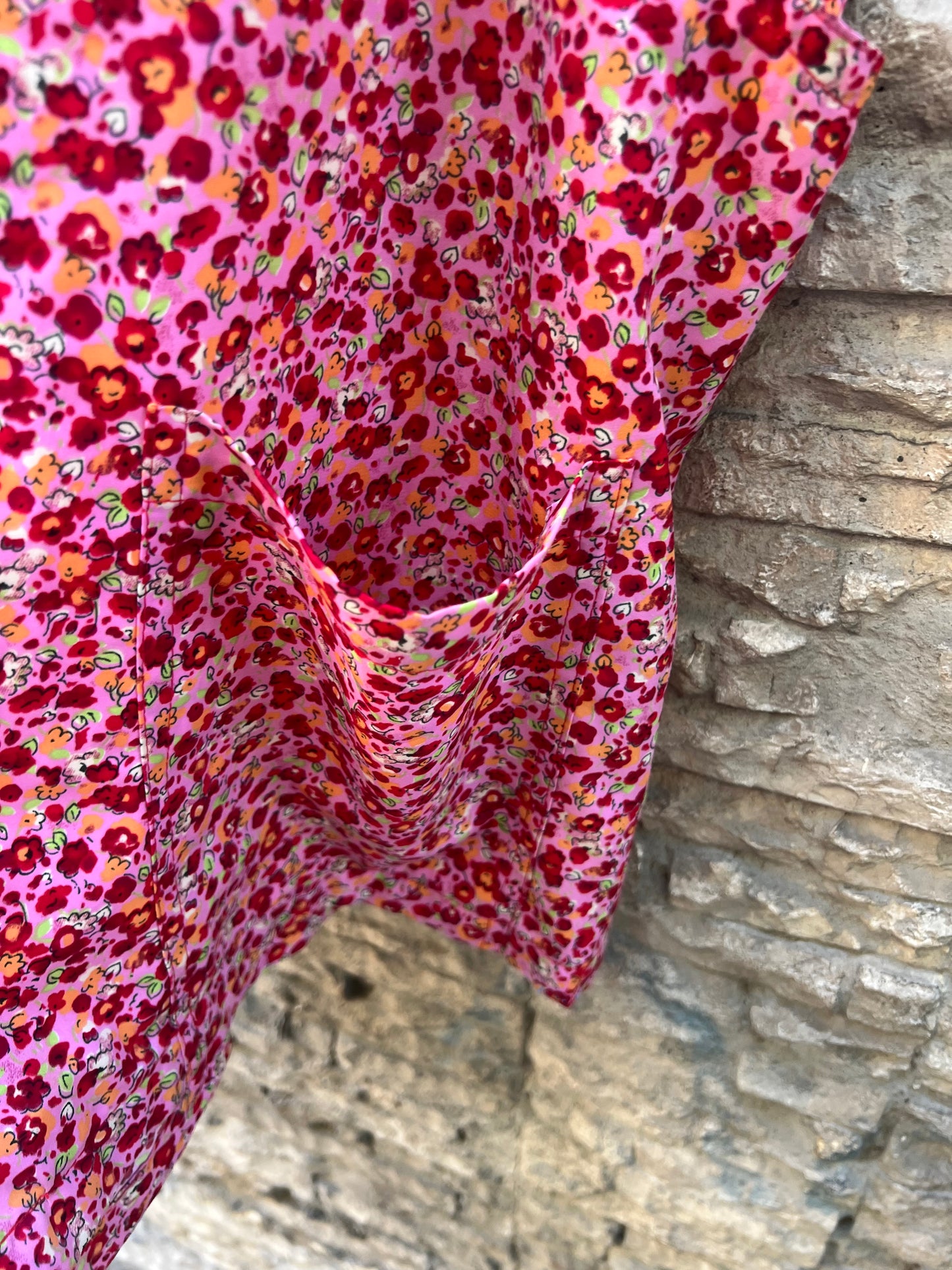 OTRAS. Peto corto flores rosas. T M