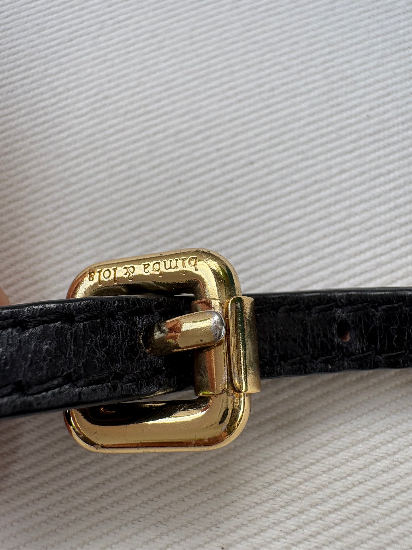 BIMBA Y LOLA. Cinturón fino tachuelas piel. TU