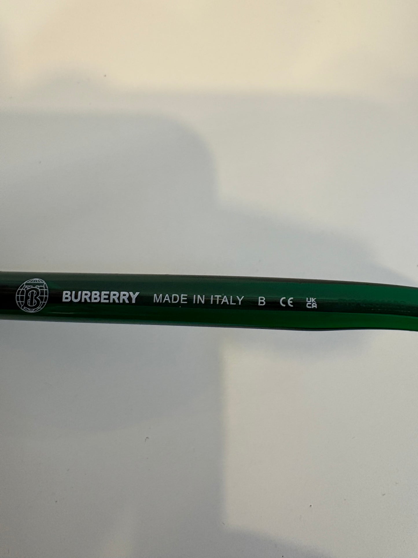BURBERRY. Green-framed sunglasses