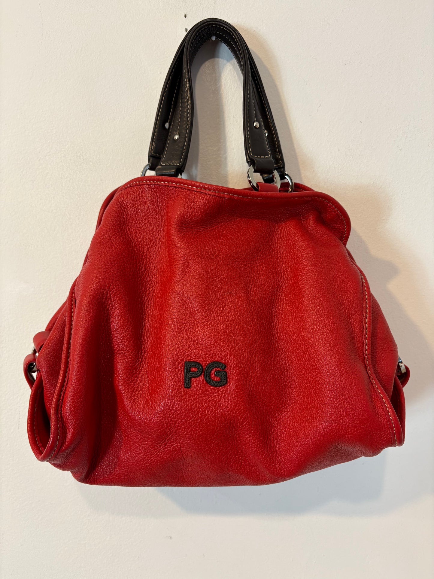 PURIFICACION GARCIA. Bolso de mano rojo
