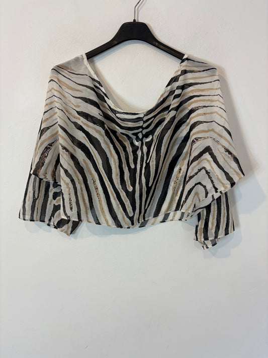 OTRAS. Top cropped efecto capa