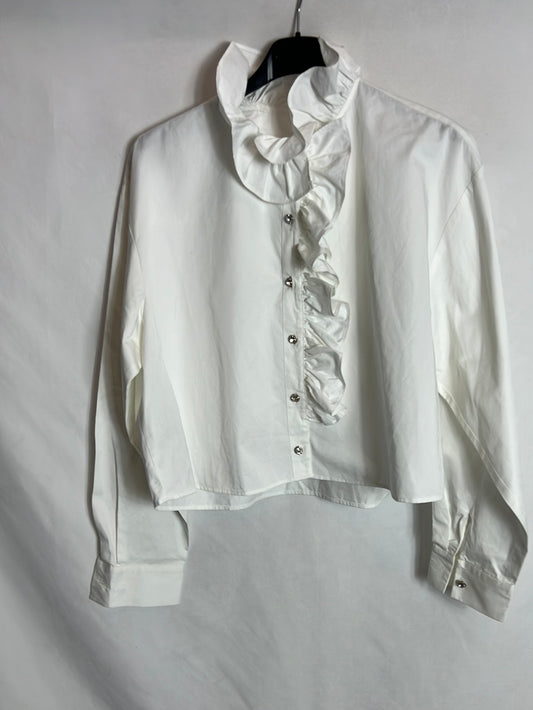 OTRAS. Blusa blanca volante y botones pedrería. T S
