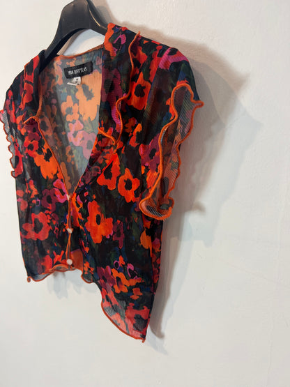 URBAN OUTFITTERS. Top flores semitransparente. T M