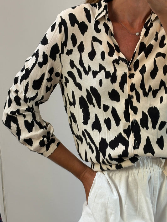 MANGO. Blusa fluida estampada. T M