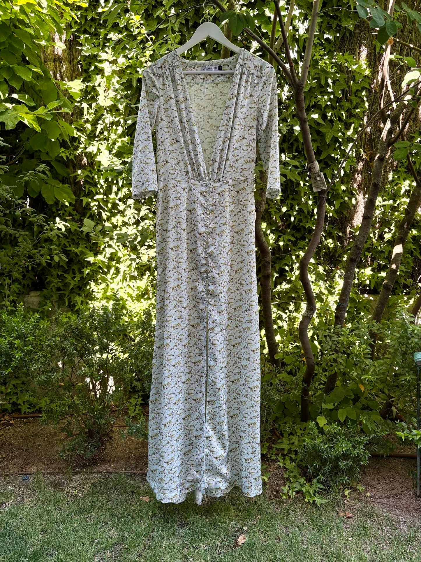 MELENA DE LEON. Vestido largo estampado aberturas
