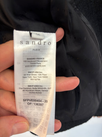 SANDRO. Chaqueta negra tweed bolsillos