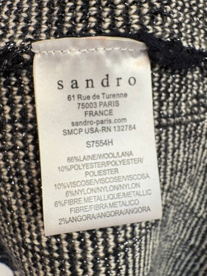 SANDRO. Top punto negro estampado lana